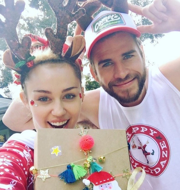 H Miley Cyrus με τον συζυγο της